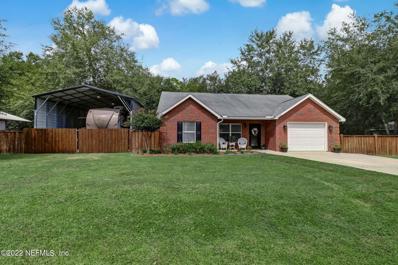 Hilliard, FL home for sale located at 27060 Country Dr, Hilliard, FL 32046