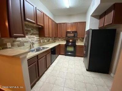 Jacksonville, FL home for sale located at 7053 Snowy Canyon Dr UNIT 102, Jacksonville, FL 32256