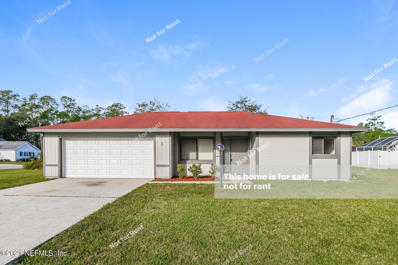 Palm Coast, FL home for sale located at 1 Brunett Ln, Palm Coast, FL 32137