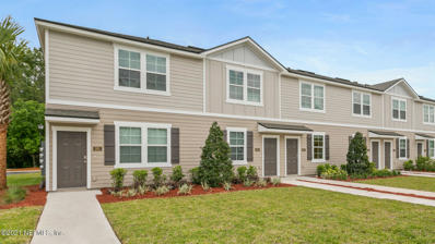 Orange Park, FL home for sale located at 525 Running Woods St, Orange Park, FL 32065