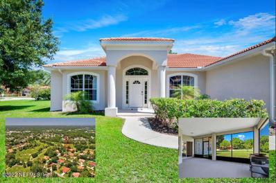 Palm Coast, FL home for sale located at 8 Village Cir, Palm Coast, FL 32164