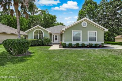 Fleming Island, FL home for sale located at 1500 Marsh Rabbit Way, Fleming Island, FL 32003