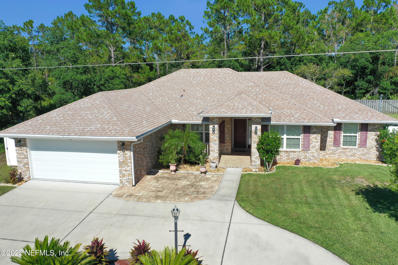 Palm Coast, FL home for sale located at 38 Wood Center Ln, Palm Coast, FL 32164