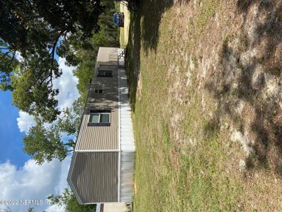 Interlachen, FL home for sale located at 131 Claudia St, Interlachen, FL 32148