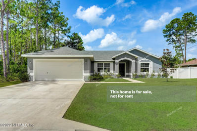 Palm Coast, FL home for sale located at 126 Laguna Forest Trl, Palm Coast, FL 32164