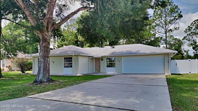 Palm Coast, FL home for sale located at 22 Rollins Ln, Palm Coast, FL 32164