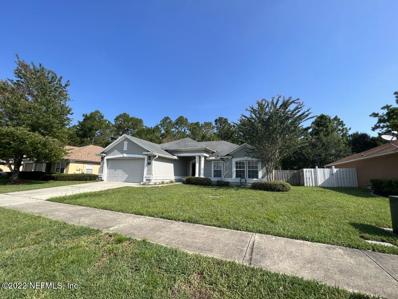 Jacksonville, FL home for sale located at 11335 Justin Oaks Dr N, Jacksonville, FL 32221