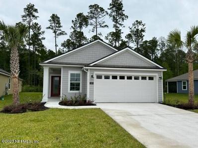 St Augustine, FL home for sale located at 53 Dove Tree Ln, St Augustine, FL 32095