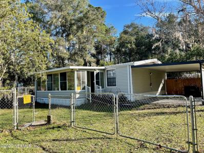 Hawthorne, FL home for sale located at 5627 223RD St, Hawthorne, FL 32640