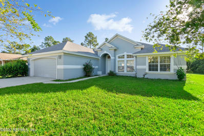 Palm Coast, FL home for sale located at 55 Russo Dr, Palm Coast, FL 32164