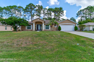 Palm Coast, FL home for sale located at 112 Ramblewood Dr, Palm Coast, FL 32164