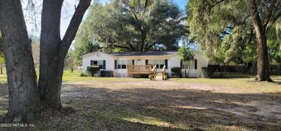 Hampton, FL home for sale located at 11205 SW 92ND St, Hampton, FL 32044