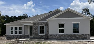 Middleburg, FL home for sale located at 1479 Lake Foxmeadow, Middleburg, FL 32068