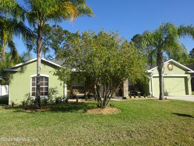 Palm Coast, FL home for sale located at 66 Sloganeer Trl, Palm Coast, FL 32164