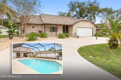 Palm Coast, FL home for sale located at 74 Wedgewood Ln, Palm Coast, FL 32164