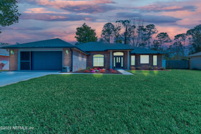 Palm Coast, FL home for sale located at 50 Pepperdine Dr, Palm Coast, FL 32164