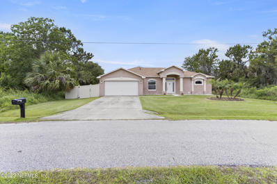 Palm Coast, FL home for sale located at 33 Ludlow Ln E, Palm Coast, FL 32137
