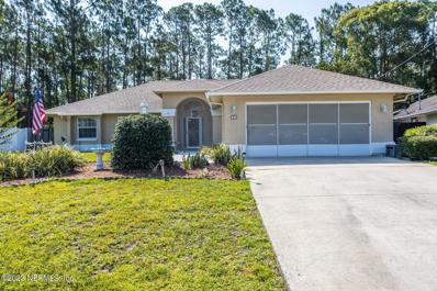 Palm Coast, FL home for sale located at 18 Woodworth Dr, Palm Coast, FL 32164