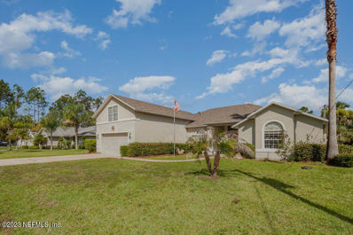 Palm Coast, FL home for sale located at 75 Brownstone Ln, Palm Coast, FL 32137